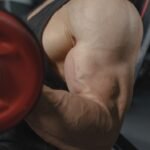 Meccanismi ipertrofia muscolare curl bicipiti Nutrizionista Sportivo Catania